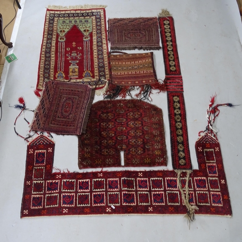 2418 - A group of Antique Turkish and Persian saddle bags, mats and wall hangings (7)