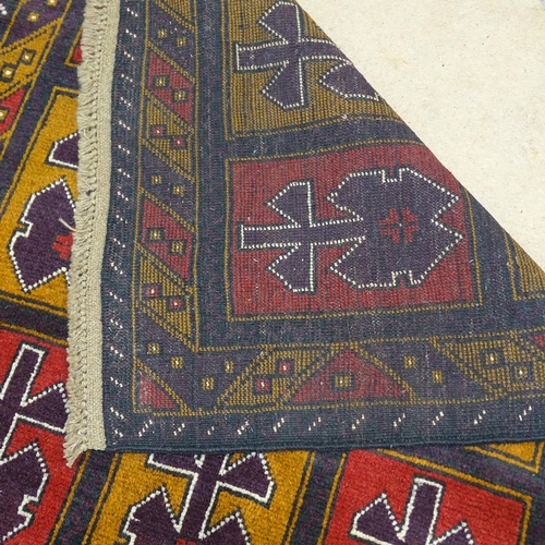 2420 - A blue ground Baluchi rug, 133cm x 87cm