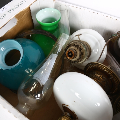 822 - Various oil lamps, shades etc