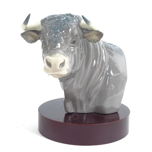 824 - Lladro - El Torro bulls head on stand, height 18cm