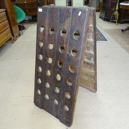 2725 - An A-Frame pine wine rack.