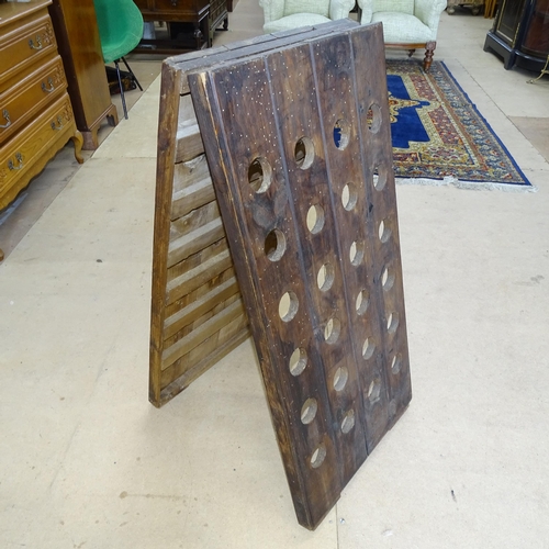 2725 - An A-Frame pine wine rack.