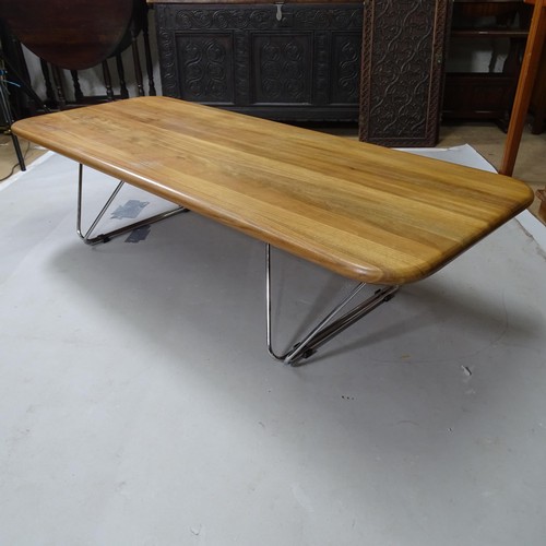 2427 - A mid century teak coffee table with lable for Herman Miller, 150cm x 38cm x 60cm