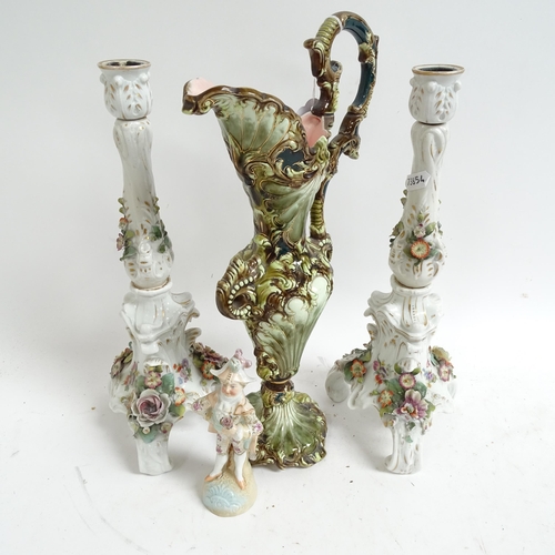 247 - A pair of Vienna porcelain candlesticks, with flower encrusted decoration, height 33cm, and an Austr... 