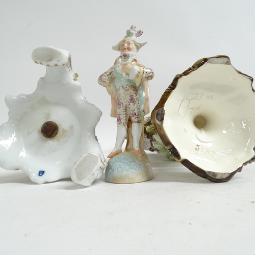 247 - A pair of Vienna porcelain candlesticks, with flower encrusted decoration, height 33cm, and an Austr... 