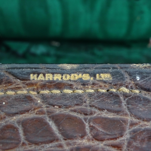 64 - HARRODS - an Antique crocodile skin Gladstone bag, W40cm, H20cm, D26cm