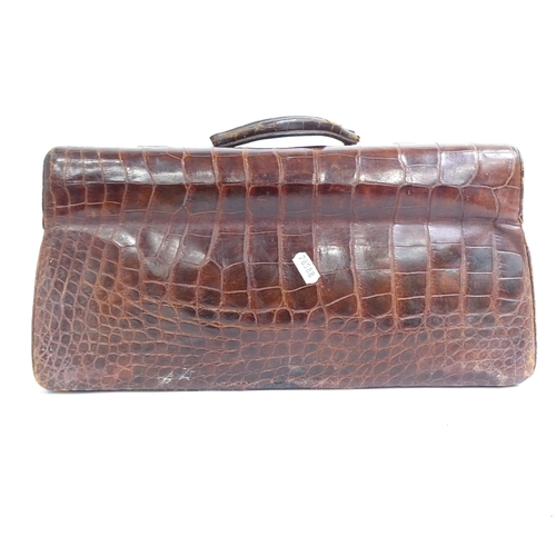 64 - HARRODS - an Antique crocodile skin Gladstone bag, W40cm, H20cm, D26cm