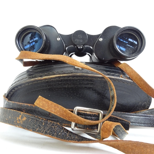 214 - A pair of Tecnar by Swift 8x30 binoculars, serial no. 15445, cased, and a pair of Zenith 10x50 binoc... 