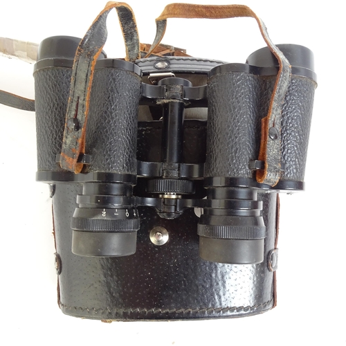 214 - A pair of Tecnar by Swift 8x30 binoculars, serial no. 15445, cased, and a pair of Zenith 10x50 binoc... 