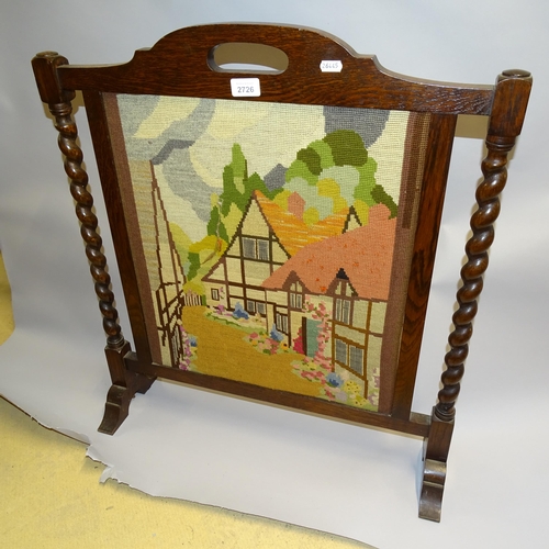 2726 - A 1920s oak barley twist fire screen with tapestry panel. H - 72cm.