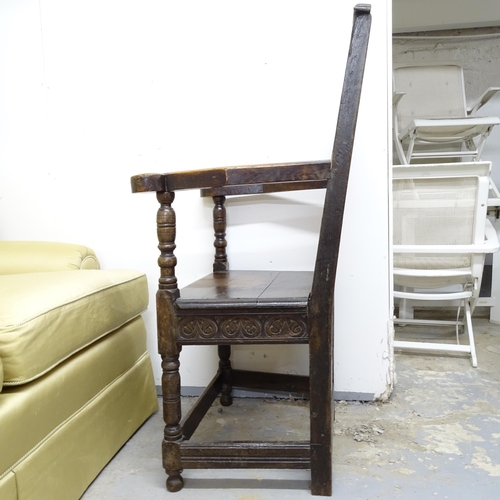 2599 - A 18/19th Century carved and panelled oak Wainscott Hall chair