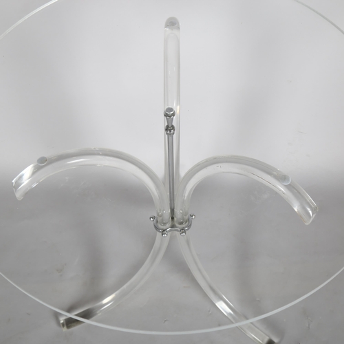 1562 - A 1970s' lucite tripod side table, in the manner of CHARLES HOLLIS, height 69cm, diameter 67cm