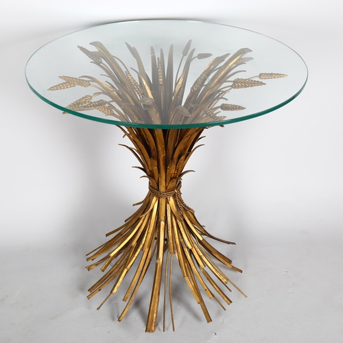 1565 - A Hollywood Regency style mid-century side table, with gilded wheatsheaf design base, height 71cm, d... 