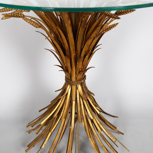 1565 - A Hollywood Regency style mid-century side table, with gilded wheatsheaf design base, height 71cm, d... 