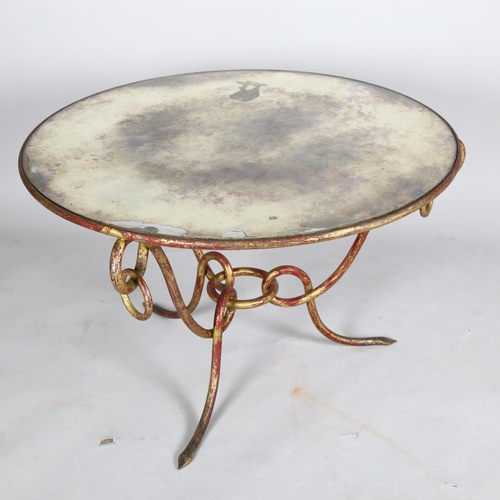 1566 - RENE DROUET, a French wrought iron coffee table, with distressed mirror top, height 52cm, diameter 8... 