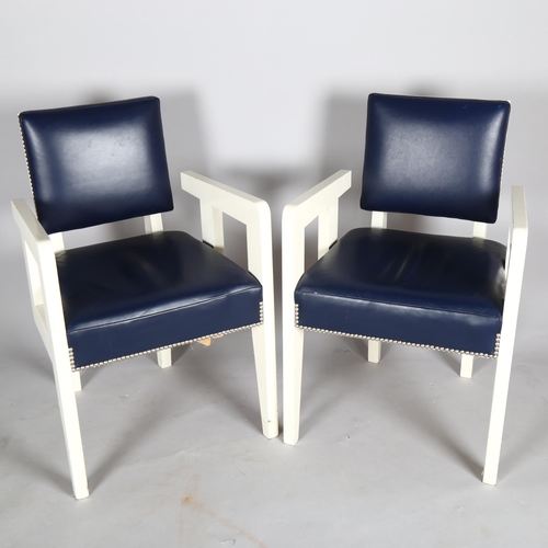 1569 - A pair of mid-century French armchairs, in the manner of ANDRE SORNAY with leather upholstery and la... 