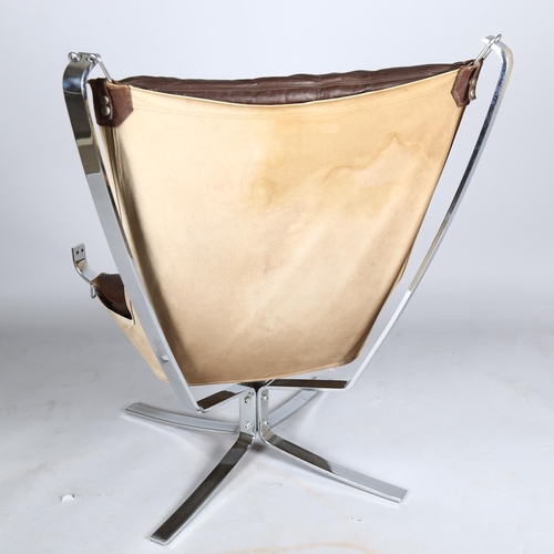 1570 - A SIGURD RESSELL Falcon chair, in chromed metal with leather seat pad and cloth sling, height 101cm ... 