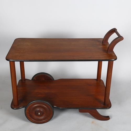 1586 - A mid-century Heals style teak tea trolley with large teak wheels