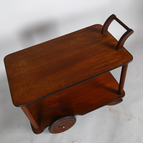 1586 - A mid-century Heals style teak tea trolley with large teak wheels