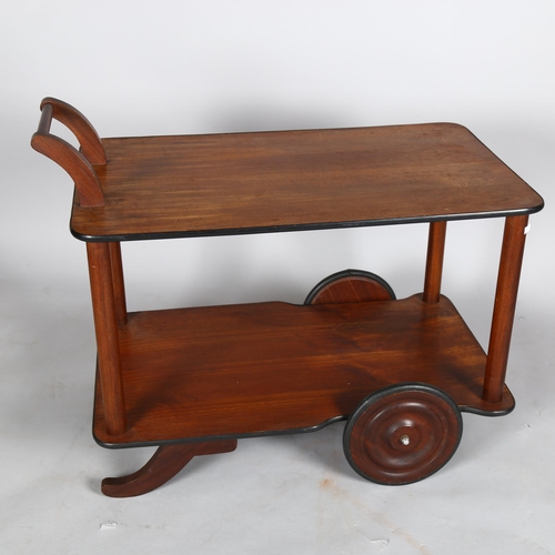 1586 - A mid-century Heals style teak tea trolley with large teak wheels