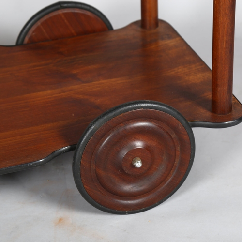 1586 - A mid-century Heals style teak tea trolley with large teak wheels