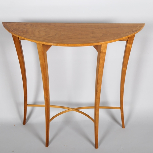1599 - PHILIP KOOMAN, a contemporary craftsman made demi-lune hall table, in satin walnut, height 74cm, wid... 