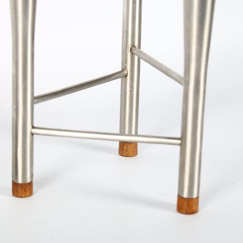 1614 - ROBERT WELCH, a Campden stainless steel triple candleholder with teak feet, with maker’s mark to leg... 