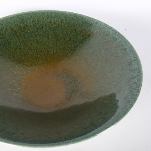 1635 - Poole Pottery, an early studio bowl with blue dolphin mark, dia27cm