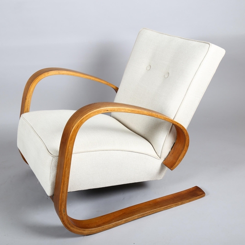 1638 - MIROSLAV NAVRATIL, a bent plywood cantilever lounge chair, for Up Zavody, 1950, height 74cm