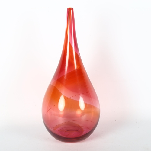 1643 - PHIL ATRILL studio glass, a ruby and amber bottle, signed to base, height 33cm