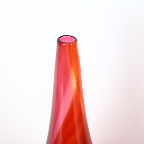 1643 - PHIL ATRILL studio glass, a ruby and amber bottle, signed to base, height 33cm