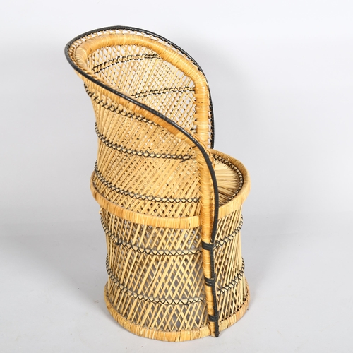 1646 - A 1970s' children's wicker Peacock chair, height 61cm