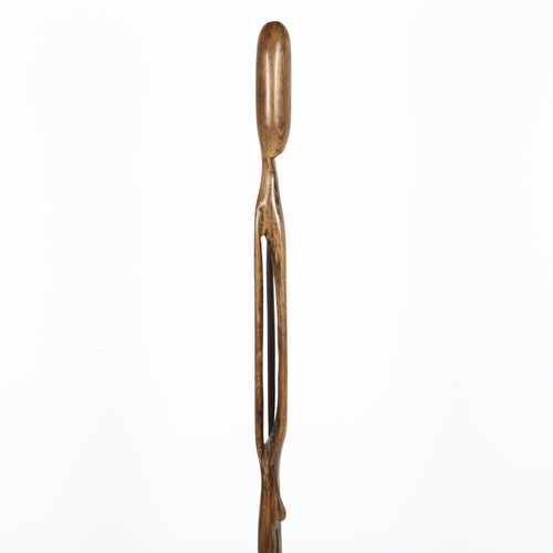 1655 - An African Nyamwezi hardwood stick figure, h 52cm