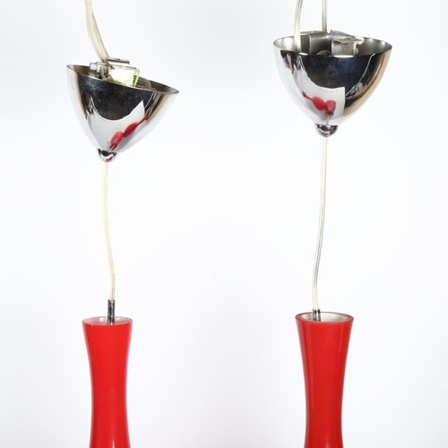 1656 - A pair of red glass pendant lights, manner of  Holmegaard, shade height 40cm