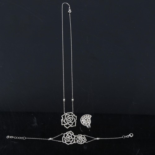 408 - A modern sterling silver and cubic zirconia demi-parure, comprising pendant necklace, bracelet and r... 