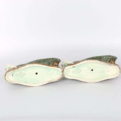 1010 - Pair of Wedgwood Majolica bowls in the form of Classical boys pulling fishing nets, impressed marks ... 