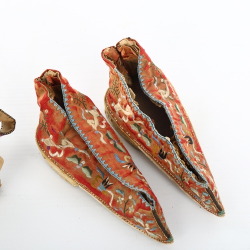 1016 - A pair of Chinese embroidered silk children's shoes, length 11cm, and another pair of embroidered si... 