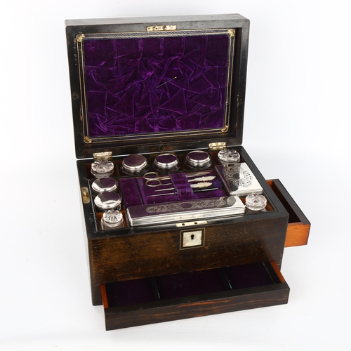 1018 - A 19th century coromandel travelling box, the interior fitted with cut-glass and electroplate boxes,... 