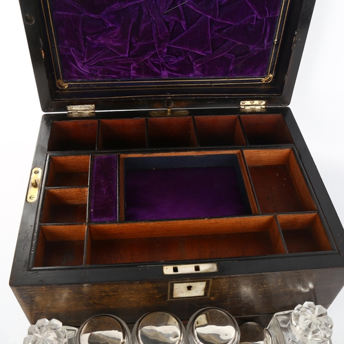 1018 - A 19th century coromandel travelling box, the interior fitted with cut-glass and electroplate boxes,... 