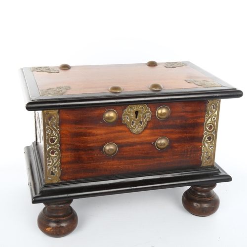 1020 - A 19th century Indian hardwood ebony and brass-mounted box with hinged lid, length 36cm