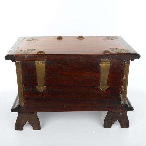 1020 - A 19th century Indian hardwood ebony and brass-mounted box with hinged lid, length 36cm