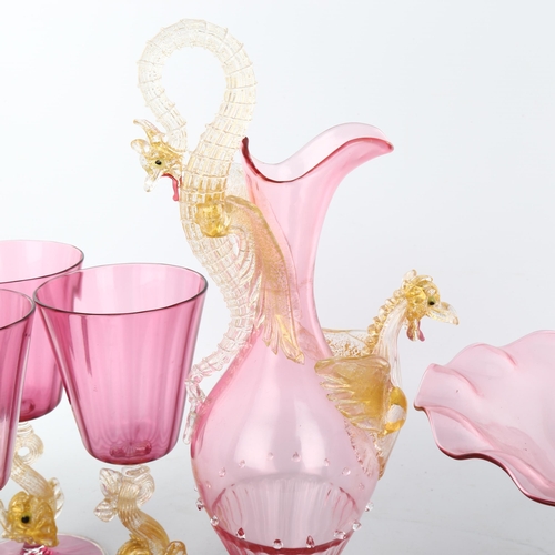 1031 - A group of Venetian pink and gold glass, including a ewer with dragon mounts, height 29cm, matching ... 