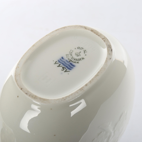 1033 - Royal Copenhagen white glaze narrow-neck vase with relief moulded decoration, height 23cm, and a Mdi... 