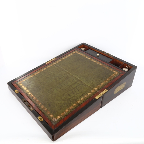 1038 - A 19th century coromandel writing box, with fitted interior, inkwells and secret compartment, length... 