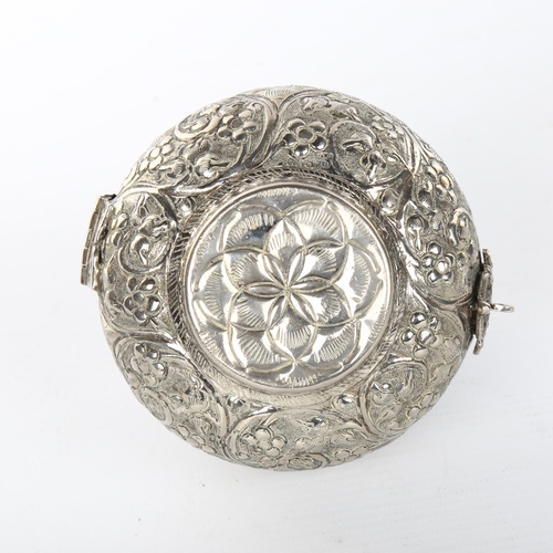 1050 - An unmarked Indian white metal box, with hinged lid and peacock knop, height 13cm, diameter 10cm