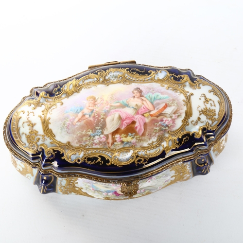 1061 - Mid-19th century Sevres porcelain ormolu mounted box of oval form, hand painted panels in relief mou... 