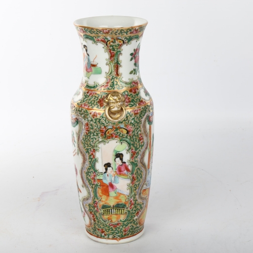 1070 - A Chinese famille rose porcelain vase, with painted enamel panels and gilded dragon handles, height ... 