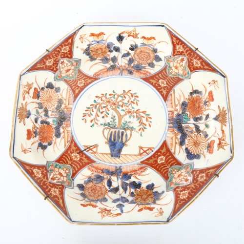 1072 - A 19th century Chinese octagonal Imari plate, with underglaze blue and enamel and gilded decoration,... 