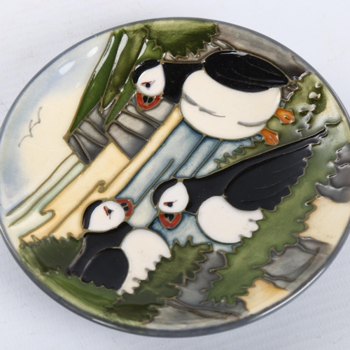 1091 - MOORCROFT POTTERY - a Puffin design dish, 1997, diameter 11.5cm