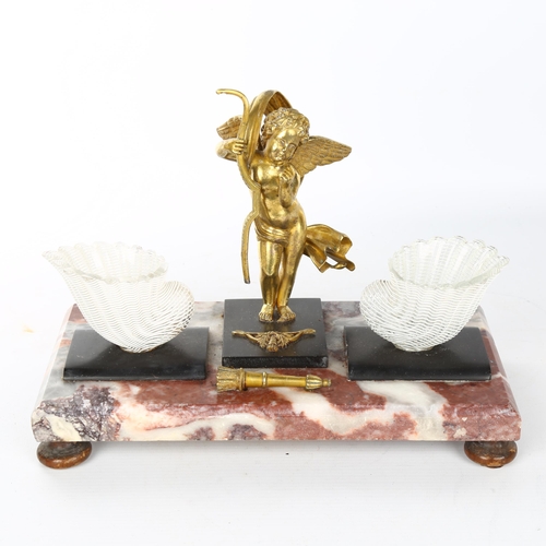 1105 - A French Empire desk stand, coloured marble and bronze with Latticino glass shell-shaped inkwell mou... 